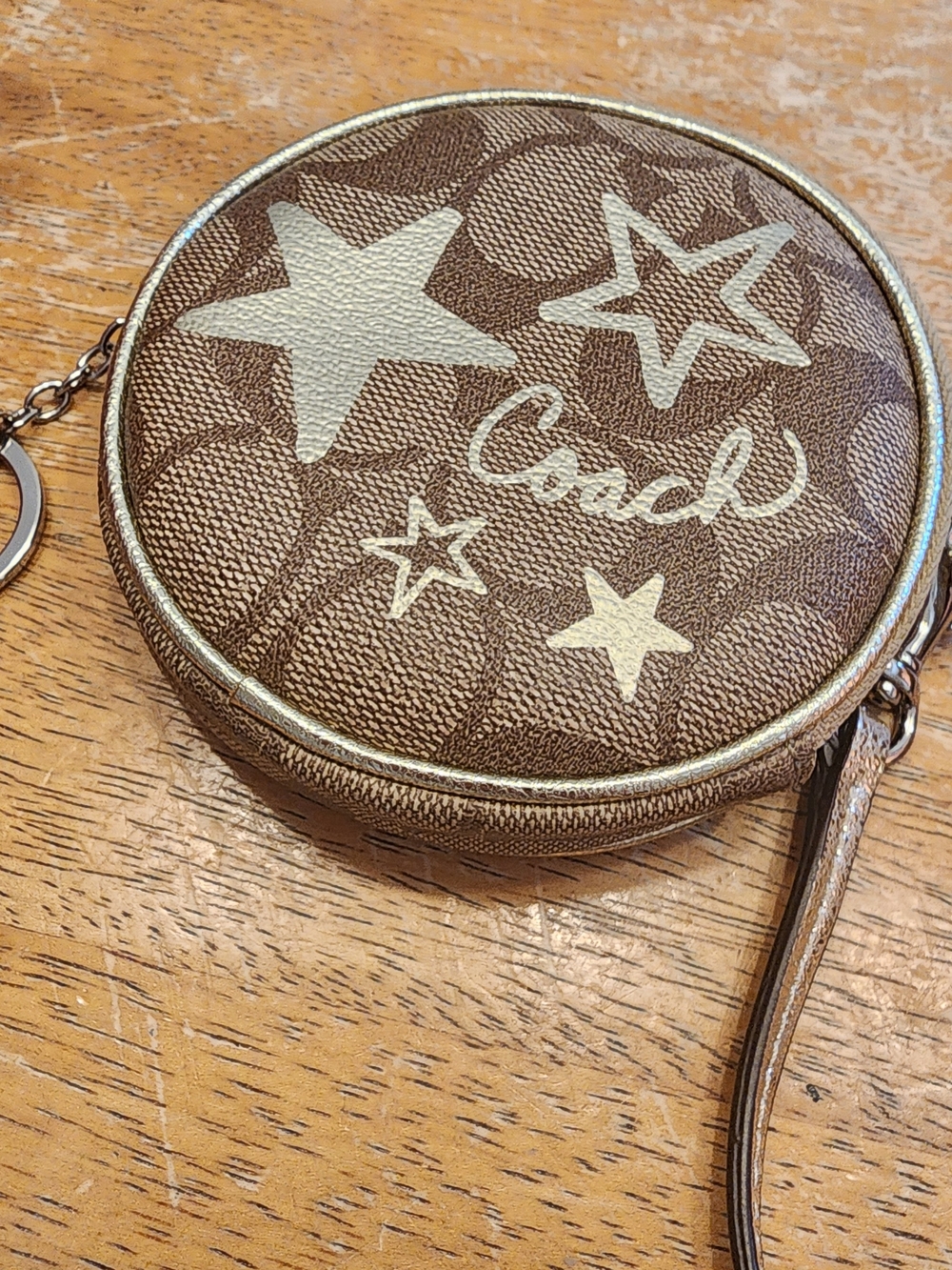 Coach Round Star Wristlet in Brown and Cream